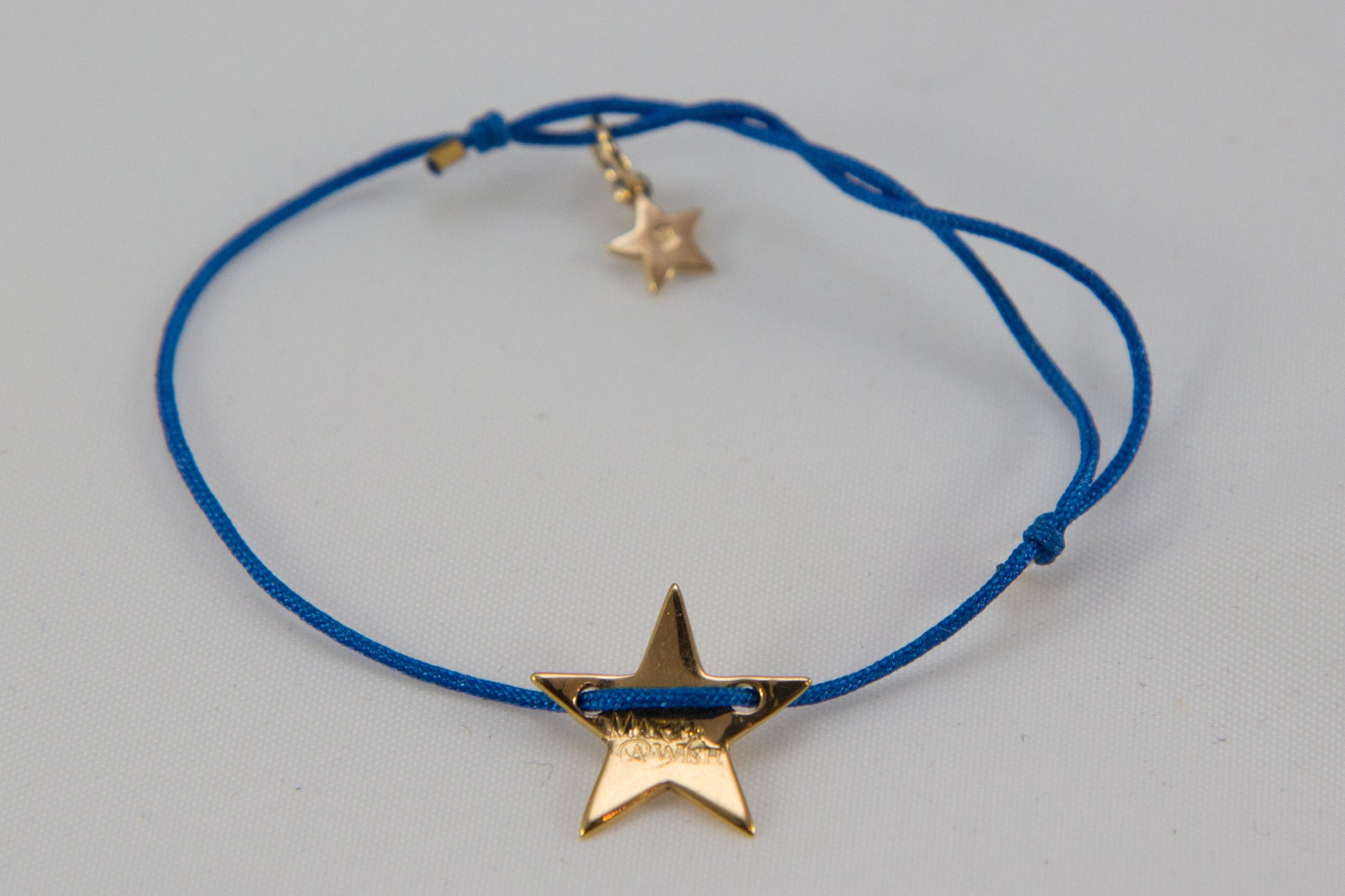 Make-A-Wish Armband goldener Sternanhänger, blaues Band